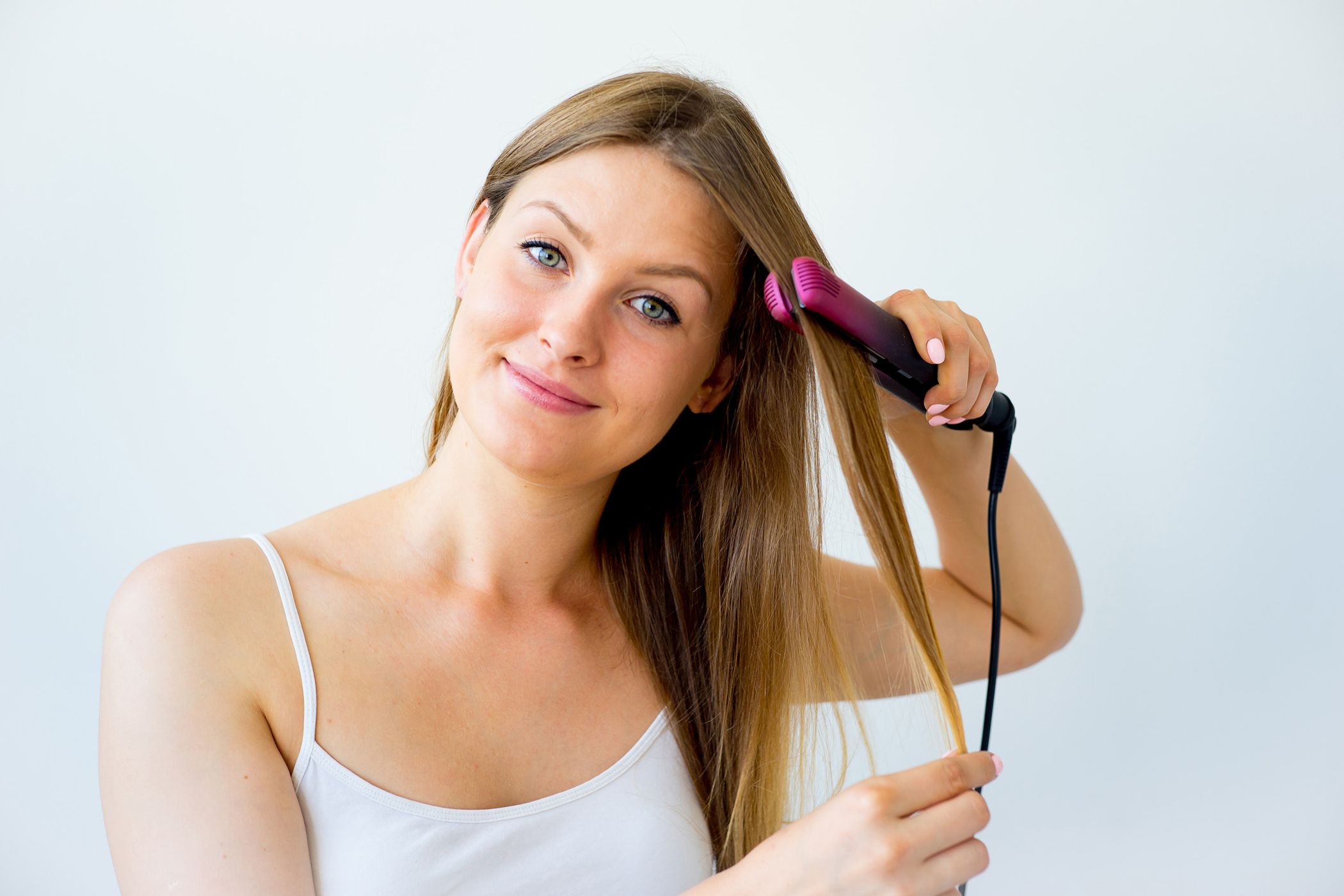 Soins capillaires : Comment faire tenir ses boucles au lisseur ?